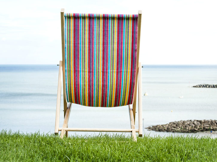 Finished deckchair On Grass Looking Out To Sea